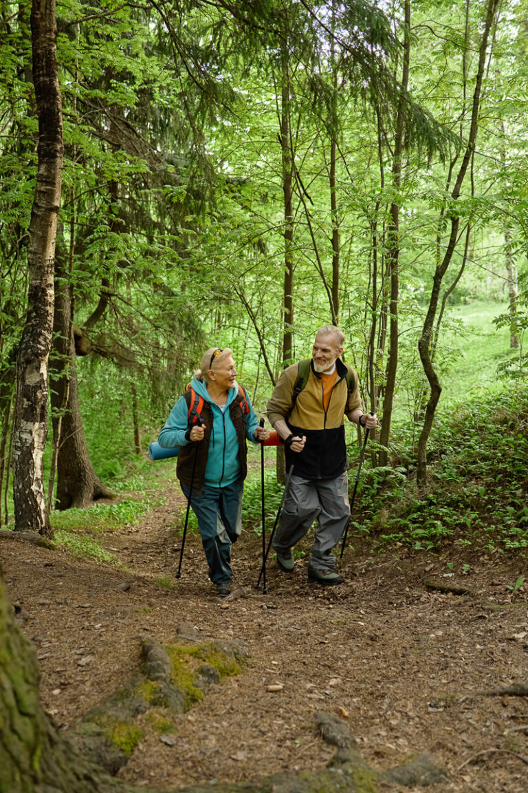 older couple hiking due to strength training for adults over 40